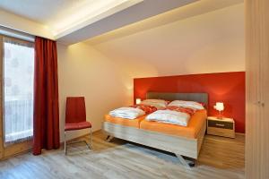 Кровать или кровати в номере Ferienhaus am Windbach