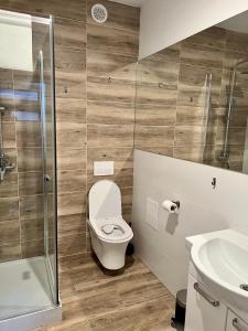 Kúpeľňa v ubytovaní Zielone Apartamenty Katowice Chorzów + 37 fotografií