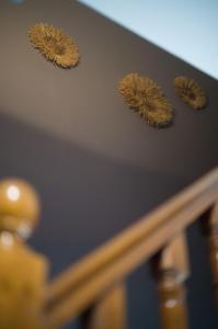 a drawer with four leaves on the top of it at Hôtel - Restaurant U Santu Petru in Saint-Florent