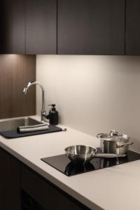 Kuchyňa alebo kuchynka v ubytovaní Apartamenty Legionów- A12 stylowy apartament w świetnej lokalizacji