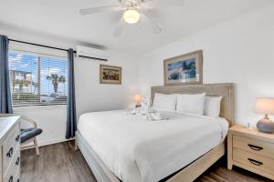 Кровать или кровати в номере 2 BR Ocean Forest Villa Steps Away From Pristine Sandy Beaches +29 фотографий