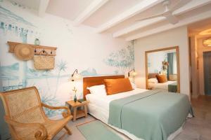 Кровать или кровати в номере Veranda Grand Baie Hotel & Spa