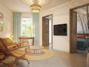 Телевизор и/или развлекательный центр в Veranda Grand Baie Hotel & Spa