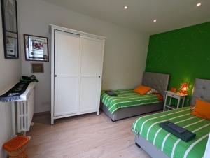 Letto o letti in una camera di Chemin des Vignerons