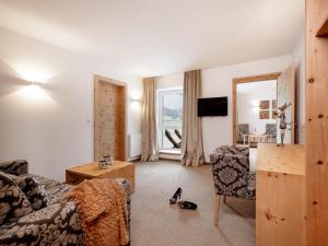 TV a/nebo společenská místnost v ubytování Alpen-Comfort-Hotel Central