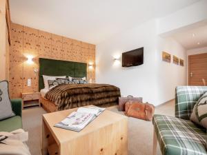 TV a/nebo společenská místnost v ubytování Alpen-Comfort-Hotel Central