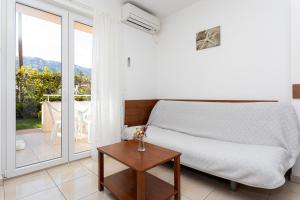 Posteľ alebo postele v izbe v ubytovaní Apartments Crneković V