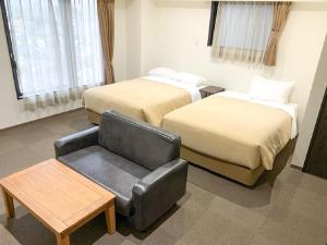 Postel nebo postele na pokoji v ubytování HOTEL LiVEMAX Kyoto Nijojonishi + 22 fotografií