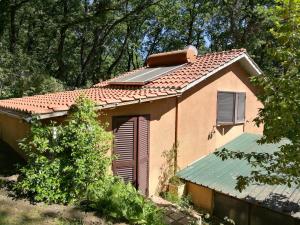 a house with a solar panel on top of it at La Casa dei Daini in Ronciglione