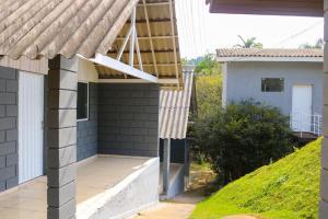 a view of a house with a roof at Chácara Misfav capacidade de 200 pessoas in Mogi das Cruzes