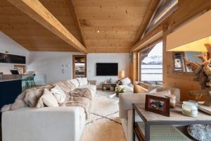 Μια τηλεόραση ή/και κέντρο ψυχαγωγίας στο Luxurious Chalet in Verbier