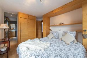Ένα ή περισσότερα κρεβάτια σε δωμάτιο στο Luxurious Chalet in Verbier
