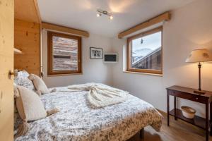 Ένα ή περισσότερα κρεβάτια σε δωμάτιο στο Luxurious Chalet in Verbier