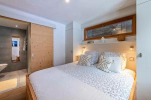 Ένα ή περισσότερα κρεβάτια σε δωμάτιο στο Luxurious Chalet in Verbier
