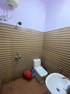 A bathroom at Breeze Arise Homestay By WB Inn