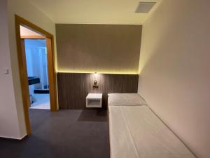 Voodi või voodid majutusasutuse Hotel Prichovice toas