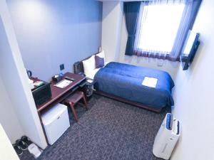 Katil atau katil-katil dalam bilik di HOTEL LiVEMAX Akasaka