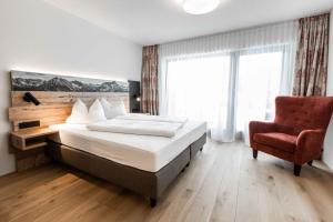 Rúm í herbergi á Hotel Alte Krone