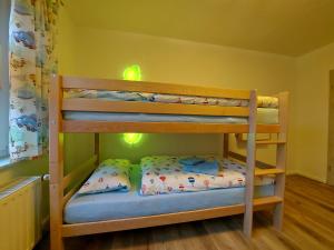 a bunk bed room with two bunk beds at Ferienhaus Hinrichs in Gembeck +39 photos