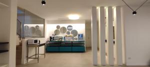 a room with a kitchen with a counter in it at B&B Giro Di Boa in Lampedusa