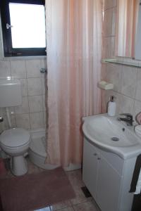 Koupelna v ubytování Apartment Una