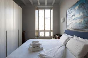 Posteľ alebo postele v izbe v ubytovaní Re Umberto luxury apartment