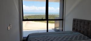 Postel nebo postele na pokoji v ubytování BARRA HOME STAY FANTASTICA Vista para o mar + 43 fotografií