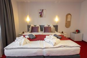 Posteľ alebo postele v izbe v ubytovaní Wellness & Restaurant U Fandy