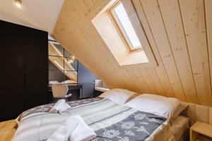 Posteľ alebo postele v izbe v ubytovaní Villa 84 & Apartments - Jacuzzi, Sauna