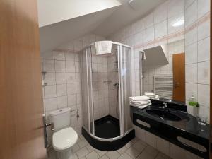 Vannituba majutusasutuses Hotel Prichovice