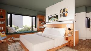 ルイスビルにあるThe Myriad Hotelのベッドルーム(白いベッド1台、大きな窓付)