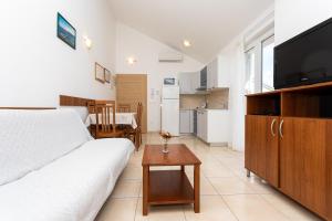 Kuchyňa alebo kuchynka v ubytovaní Apartments Crneković V