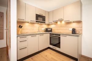 Eldhús eða eldhúskrókur á Kuckuck Hinterthal - Appartements