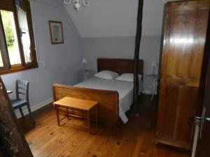 Posteľ alebo postele v izbe v ubytovaní Entre deux moulins