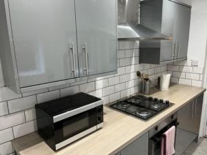 Kuchyň nebo kuchyňský kout v ubytování Oakstays Forest Hall