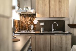 A kitchen or kitchenette at La Compagnia del Chianti