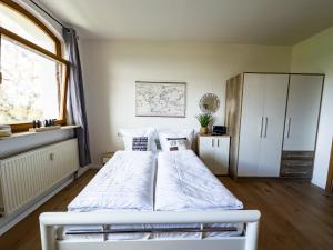 Cama ou camas em um quarto em COZY 1-Zi-Whg Nähe Straßburg & Europa Park