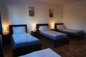 Katil atau katil-katil dalam bilik di Schöne 4-Bettzimmer Wohnung in Celle