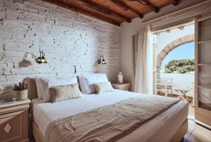 Un ou plusieurs lits dans un hébergement de l'établissement Naxos Magic Village