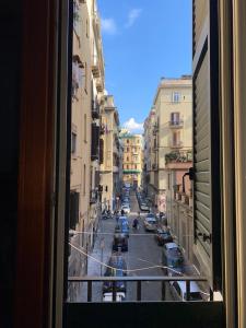 a view of a city street from a window at Savastano house in Naples