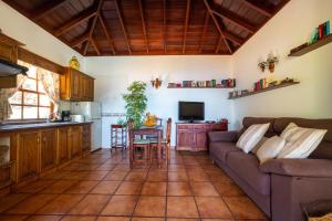 A kitchen or kitchenette at Sea view villa in Tijarafe, private pool.