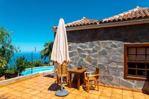The swimming pool at or close to Sea view villa in Tijarafe, private pool.