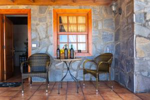 A seating area at Sea view villa in Tijarafe, private pool.
