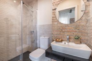 Kúpeľňa v ubytovaní Apartamentos Líbere Málaga Teatro Romano