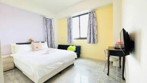TV a/nebo společenská místnost v ubytování Miss Chang's B&B