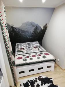 Posteľ alebo postele v izbe v ubytovaní Apartamenty na Galicówce