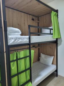 a bunk bed room with two bunk beds at FOKA Hostel in Wrocław