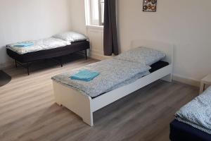 Katil atau katil-katil dalam bilik di Monteurwohnung - Vaihingen
