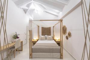 Postel nebo postele na pokoji v ubytování Villa Ino