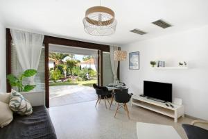 TV a/nebo společenská místnost v ubytování Sun Club Maspalomas